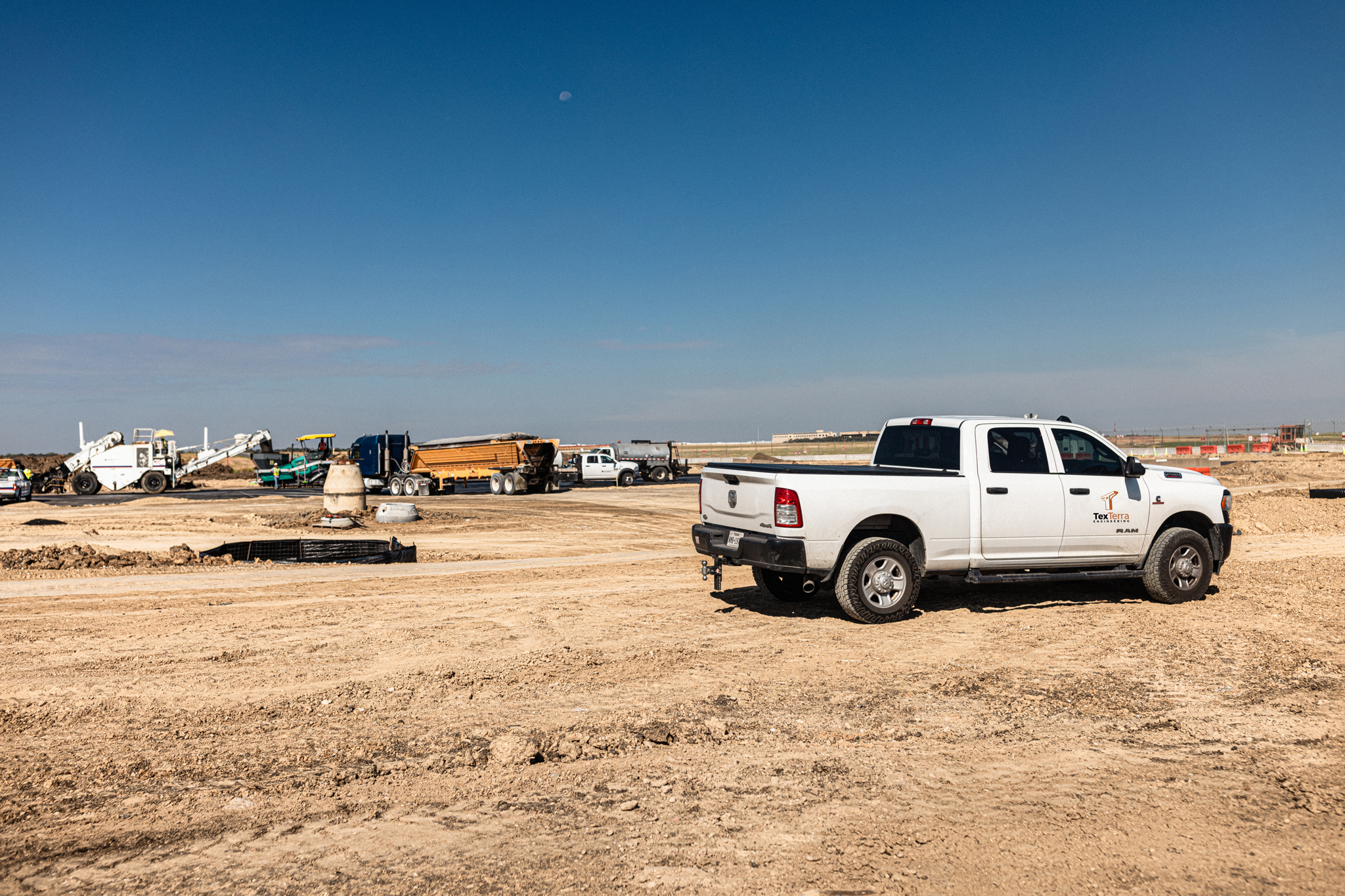 TexTerra Engineering vehicle at construction site during materials testing and inspection at DFW Airport Southwest End Around Taxiway Phase 1A